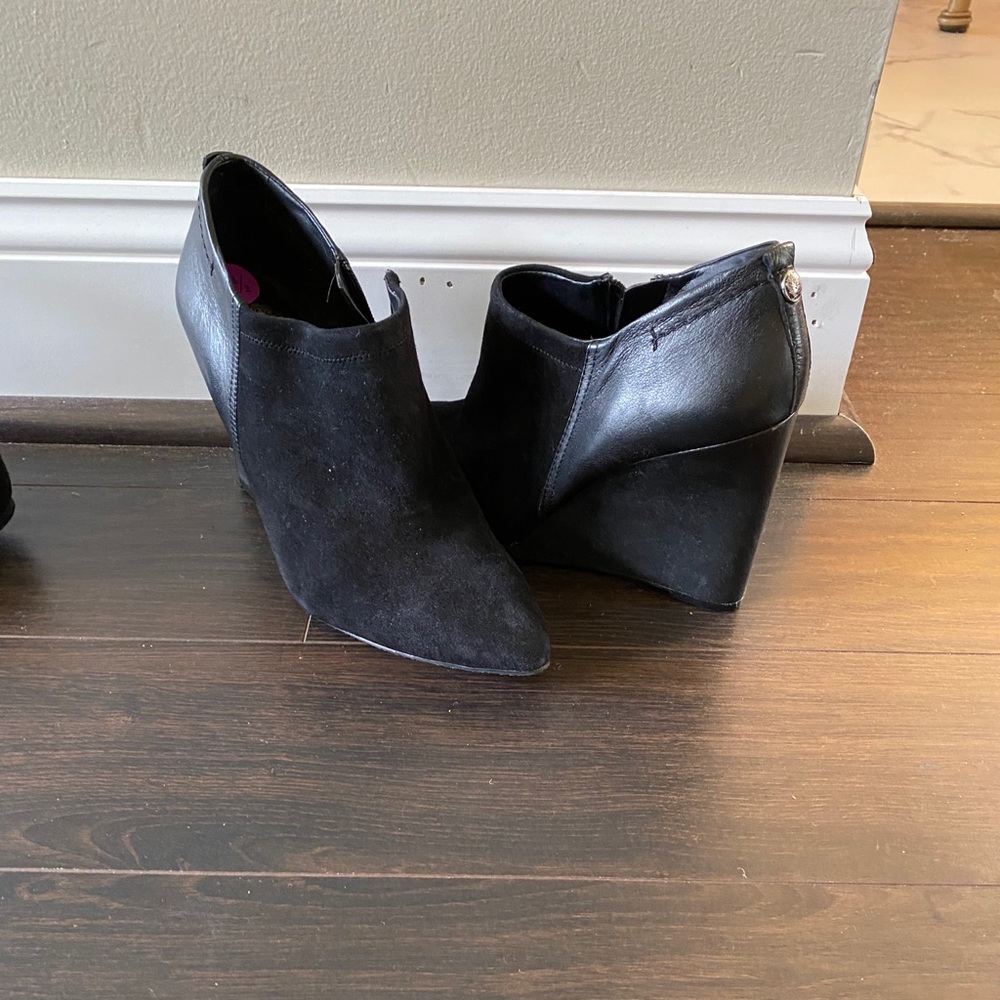 Black wedge Vince Camuto shoe bootie.